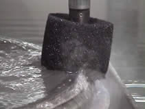 Abrasive waterjet machining and cutting in progress, at MILCO Waterjet