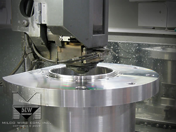 Wire EDM machining a keyway slot in a stainless steel turbine bearing housing in action on a Mitsubishi FA-20 wire EDM machine at MILCO Wire EDM