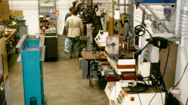 The machine shop area showing the mills, lathes, and surface grinders
