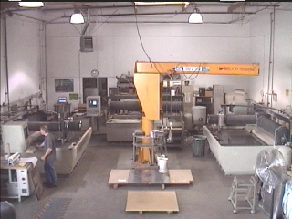 The shop floor showing the Omax 55100 waterjets with the latest Intelli-MAX software and a 2 ton capacity crane.