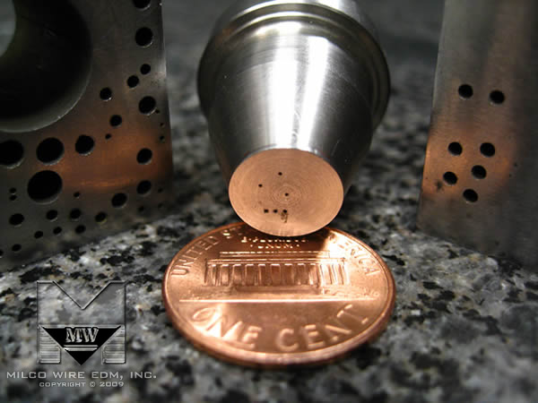 Close up view of a sample part that was made at MILCO Wire EDM using the small hole EDM drilling and micro EDM process